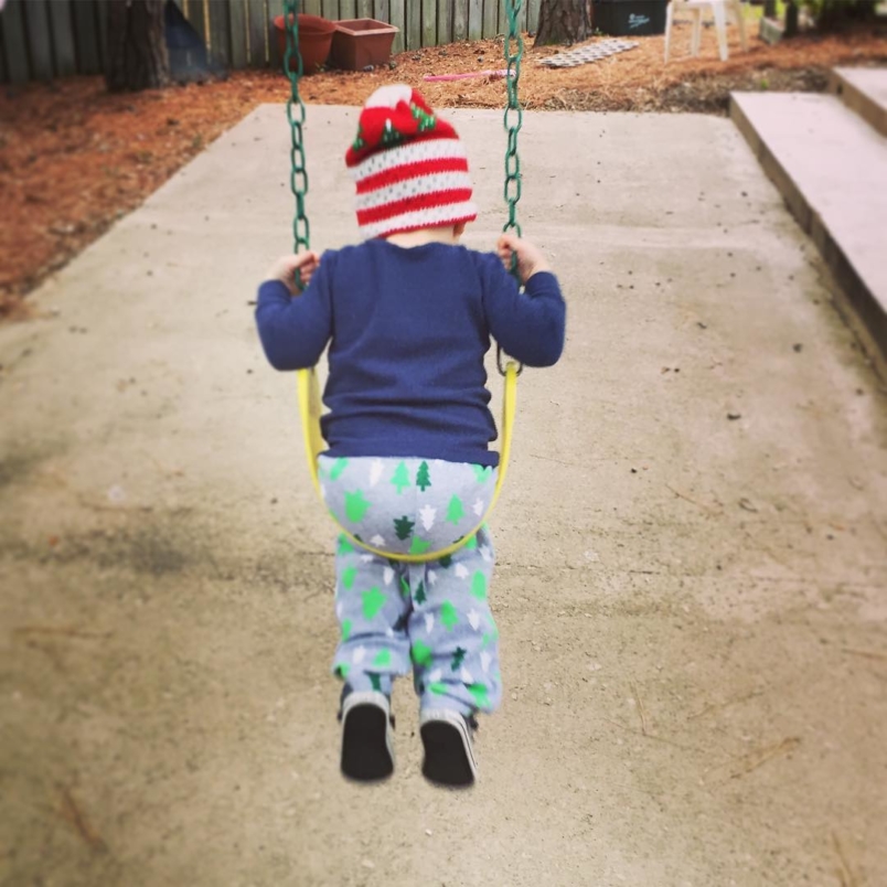 He could swing….all….day. #christmaskid #ohhowilovetogoupinaswing #liljoman