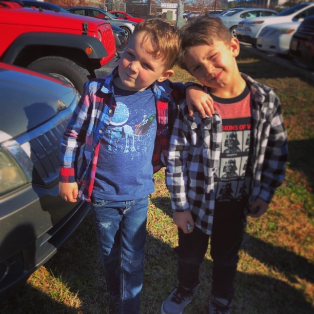 These two showed up at church today all stylish with their Star Wars shirts and flannels. #boys #greatmindsthinkalike