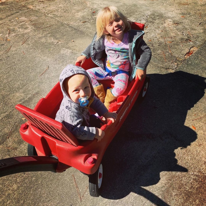 Fun morning with these two cuties! Walter Boone loved his wagon ride…..complete with happy kicking and big smiles.